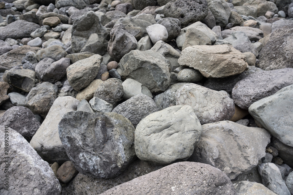 Rocks texture at Jeongbang waterfall in Jeju Island, South Korea Rocks texture at Jeongbang waterfall in Jeju Island, South Korea