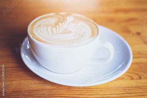 Coffee cup on the table, latte art