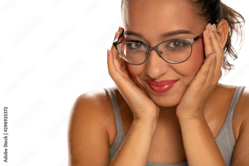 Happy young dark skinned woman with eyeglasses on white background Happy young dark skinned woman with eyeglasses on white background