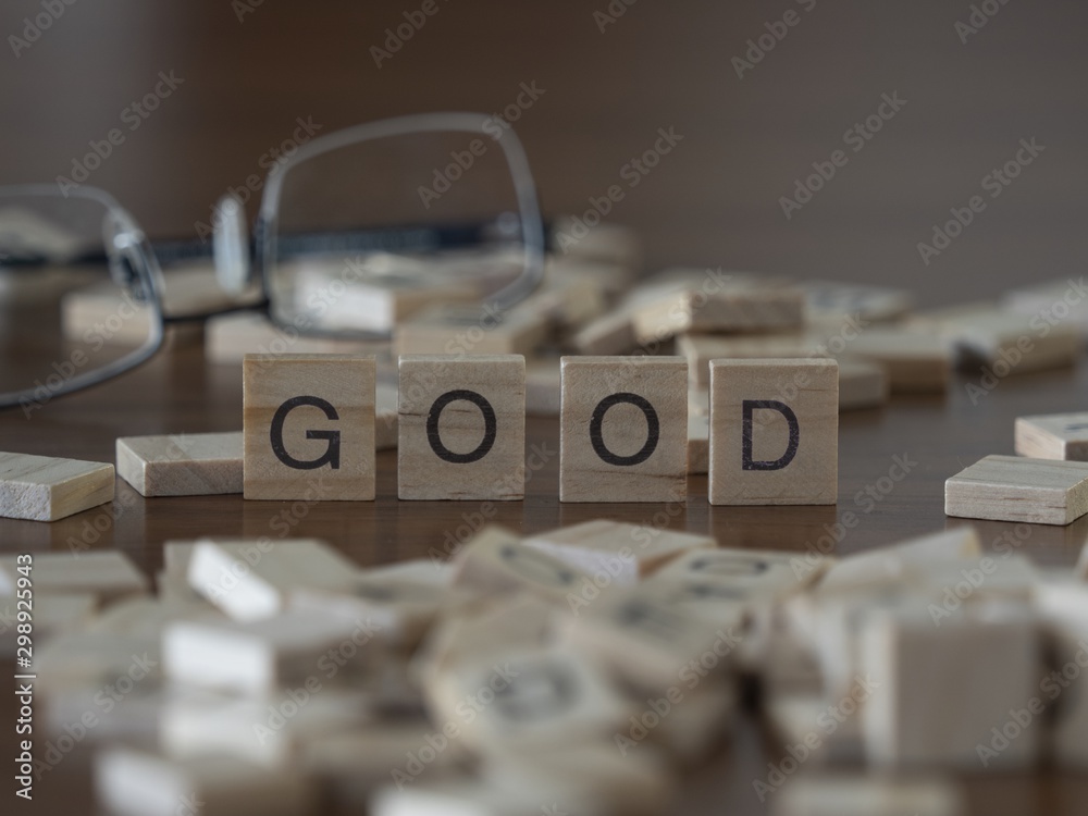 The concept of Good represented by wooden letter tiles The concept of Good represented by wooden letter tiles