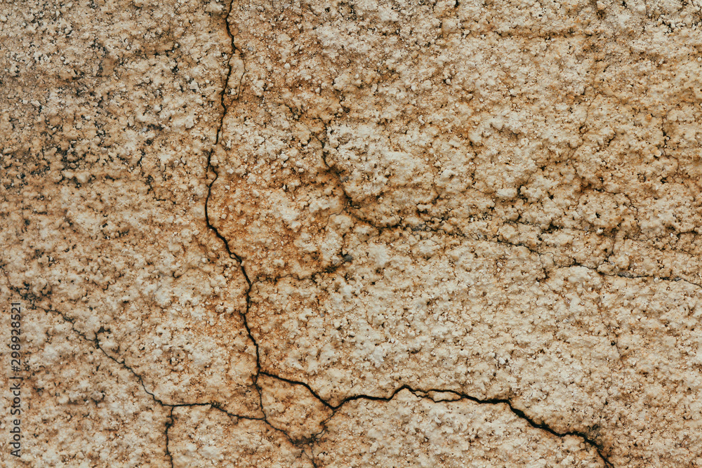 Concrete wall texture background. Natural stones. Building's facade decor.  Decorative plaster. House exterior.
