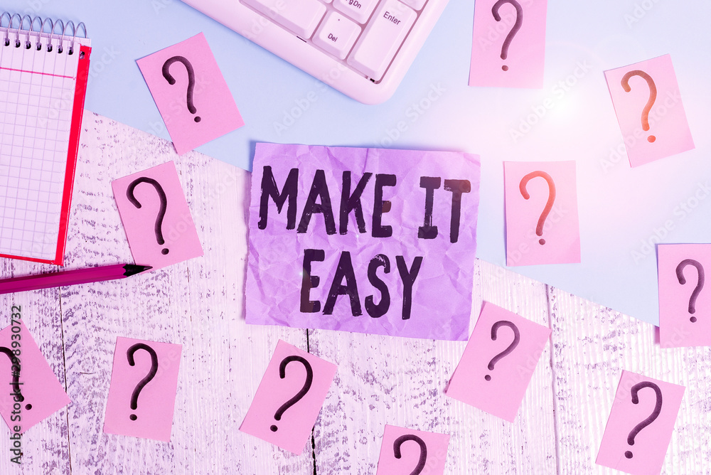Text sign showing Make It Easy. Business photo showcasing Smart approach Effortless Free from worries or difficulties Writing tools, computer stuff and math book sheet on top of wooden table Text sign showing Make It Easy. Business photo showcasing Smart approach Effortless Free from worries or difficulties Writing tools, computer stuff and math book sheet on top of wooden table