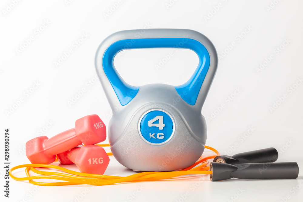 kettlebell dumbbells and jump rope Stock Photo Adobe Stock