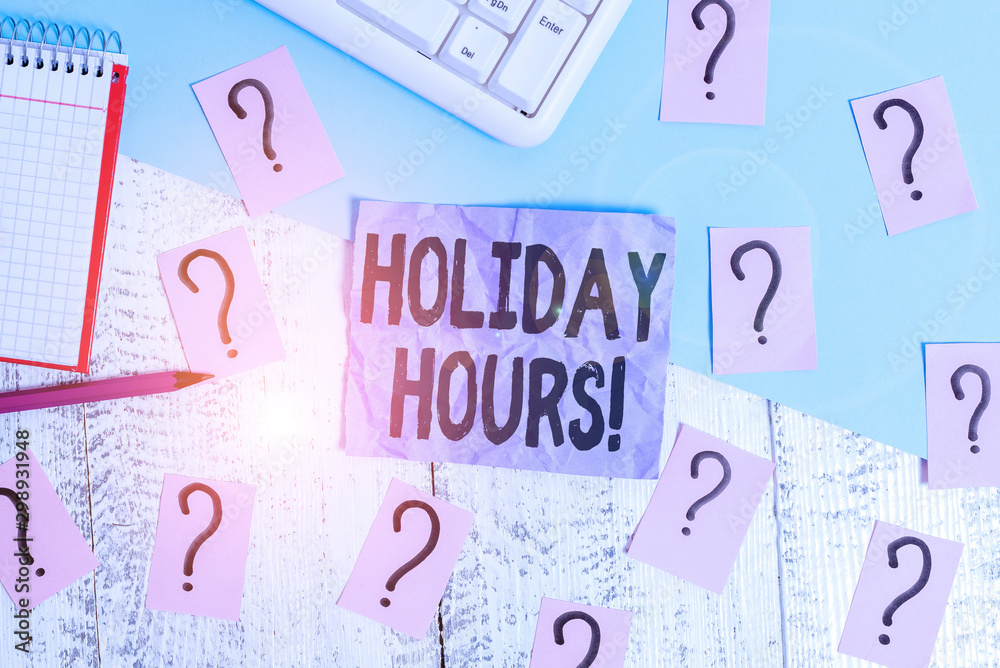 Text sign showing Holiday Hours. Business photo showcasing employee receives twice their normal pay for all hours Writing tools, computer stuff and math book sheet on top of wooden table Text sign showing Holiday Hours. Business photo showcasing employee receives twice their normal pay for all hours Writing tools, computer stuff and math book sheet on top of wooden table