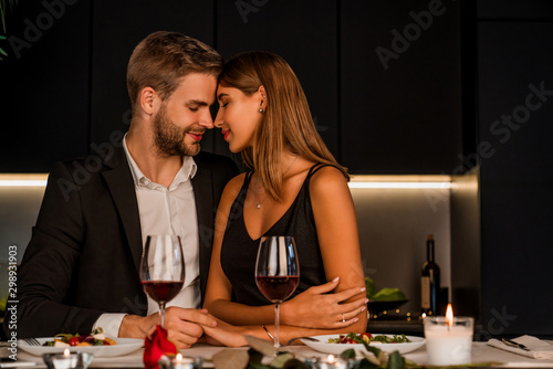 Obraz na plátně Sweet couple having romantic dinner at home