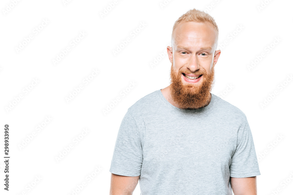 handsome smiling bearded man in grey t-shirt, isolated on white handsome smiling bearded man in grey t-shirt, isolated on white