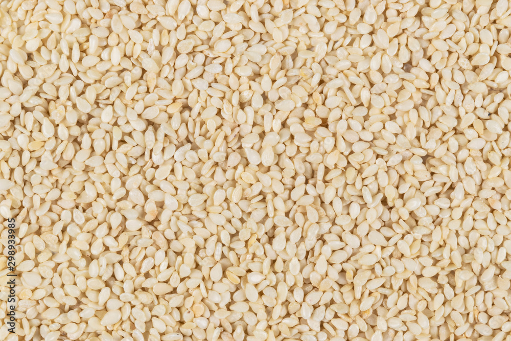 Raw white sesame seed background. Top view. Food Background. A