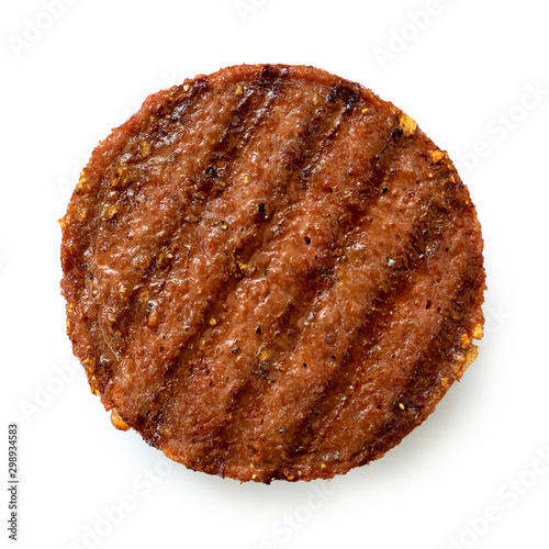 Plant based grilled burger patty with grill marks isolated on white. Top view.