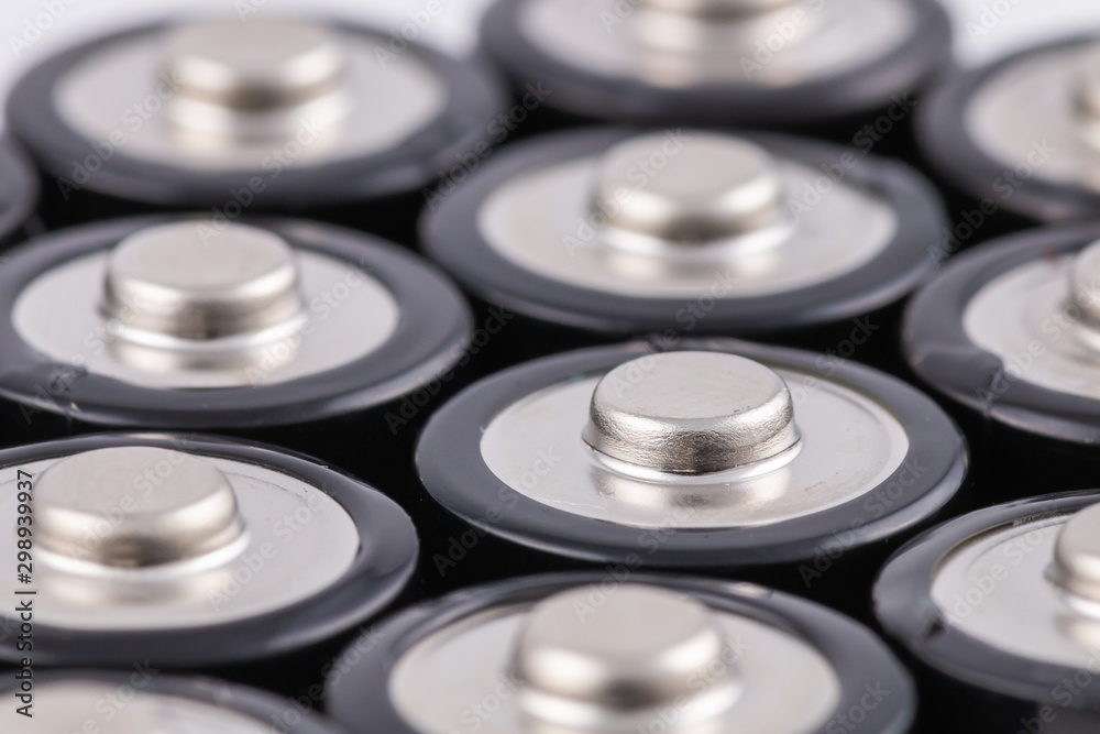 Positive terminals of AA batteries with selective focus Positive terminals of AA batteries with selective focus