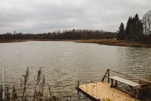 Late fall. Landscape with a lake and forest.