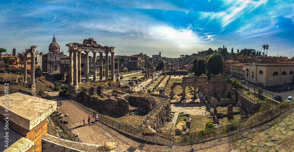 Beautiful panoramic view On Roman Forum from the hill in Rome, Italy. Scenic view on Foro Romano in Rome during nice sunny weather and blue sky