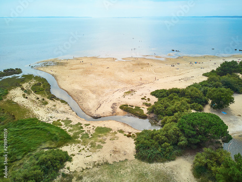 Atlantic ocean coast and estuary of Ruisseau de cires in Saint-Brice, Gironde, France photo