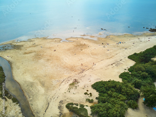 Atlantic ocean coast and estuary of Ruisseau de cires in Saint-Brice, Gironde, France photo