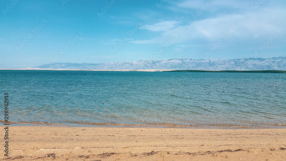 Sand beach and sea. The coast of mediterranean sea.Ždrijac Nin, Croatia