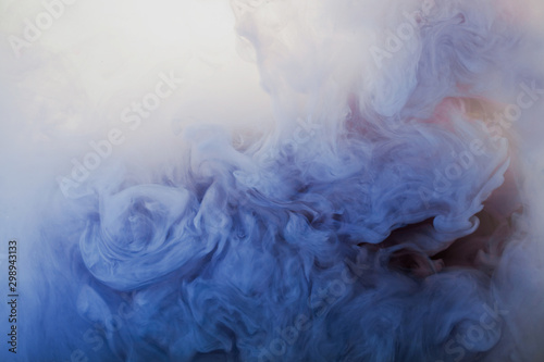 Abstract pastel blue smoke background. Paint and ink swirls in the water. Banner concept