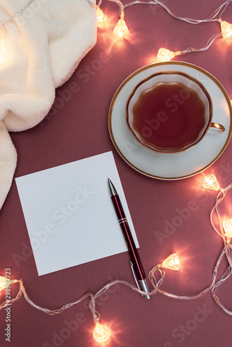 Christmas Mock up notebook with blank white paper sheet.