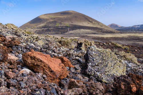 Lanzarote rocky volcanic landscape with mountains
