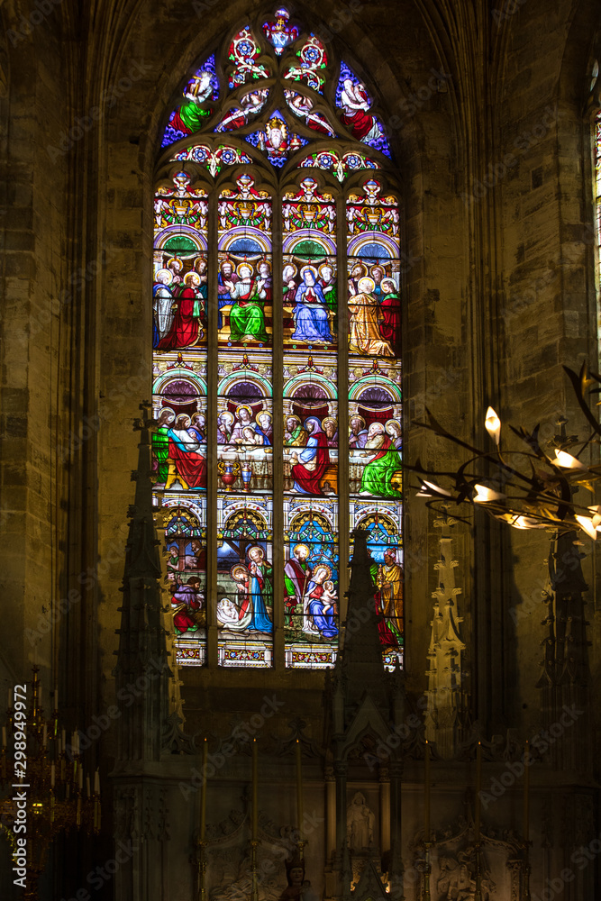  Stained glass window at the Collegiale church of Saint Emilion, France