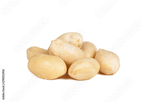 raw peeled peanuts, heap isolated on white, close-up