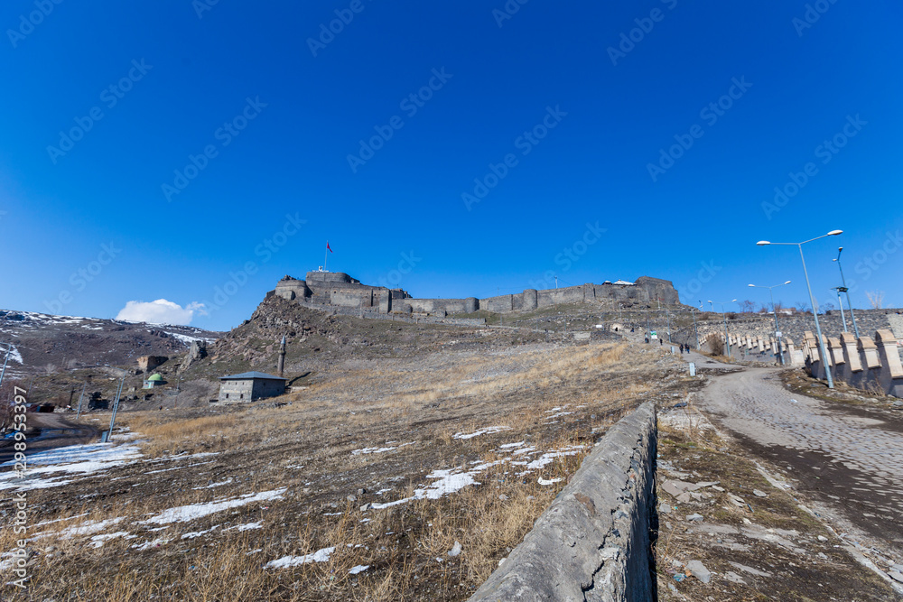 kars Castle and walls with blue sky