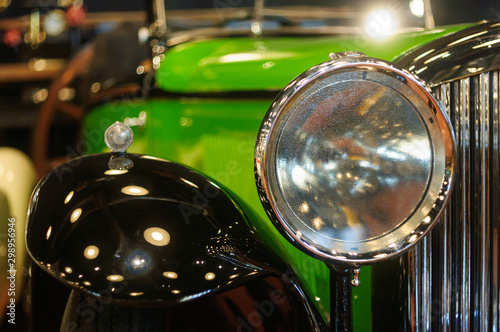 Close up of headlight of classic cars.