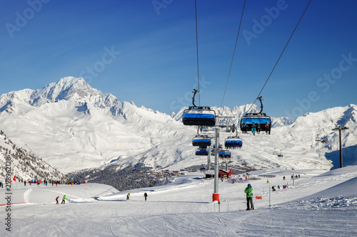 chair lift at the ski resort in the Alps