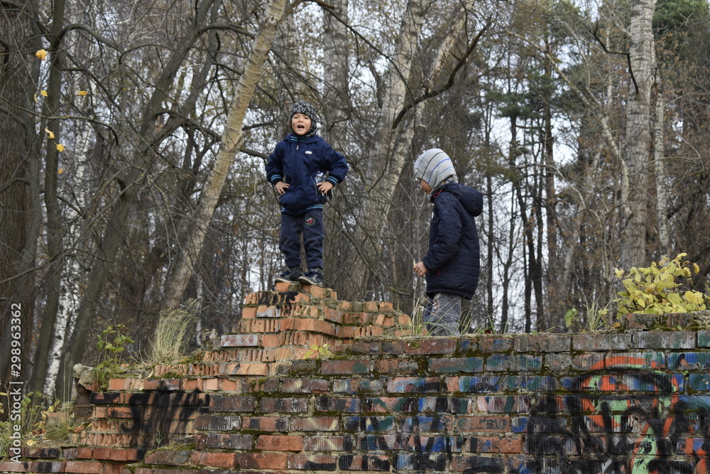 children playing in autumn park