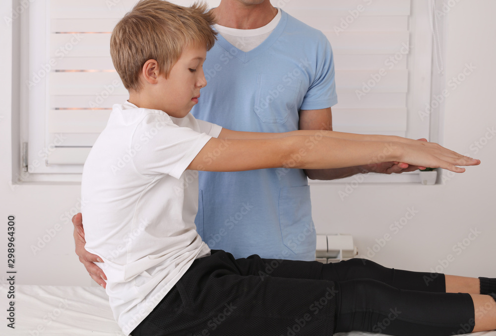 Obraz premium Physiotherapy for children, Posture Correction Exercises , Kinesiology