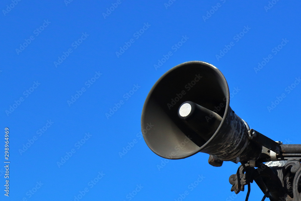 loudspeaker on a pillar against the sky background loudspeaker on a pillar against the sky background