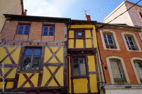 old half timbered colorful houses facade in the southern Alps  France