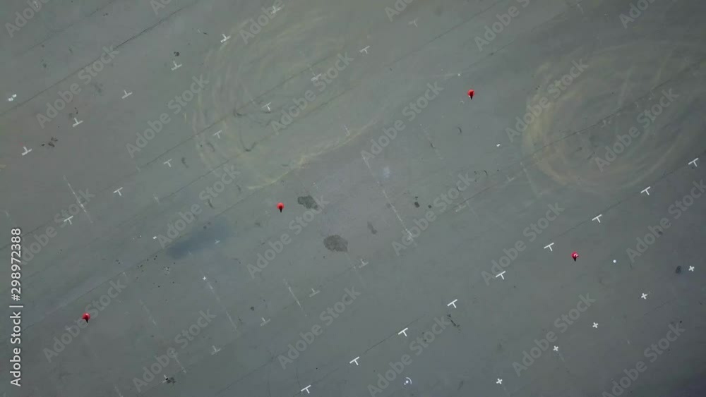 aerial view of police car at the autodrome, asphalt autodrome with road markings driving exam, police car racing car driving on a racetrack aerial