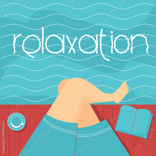 Rest on the river or sea. Wooden platform. Feet above the water, a cup of coffee, a book