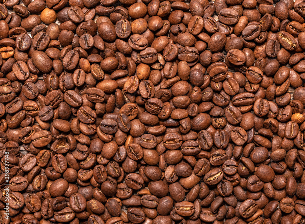 Black coffee beans closeup as a background. Black coffee beans closeup as a background.