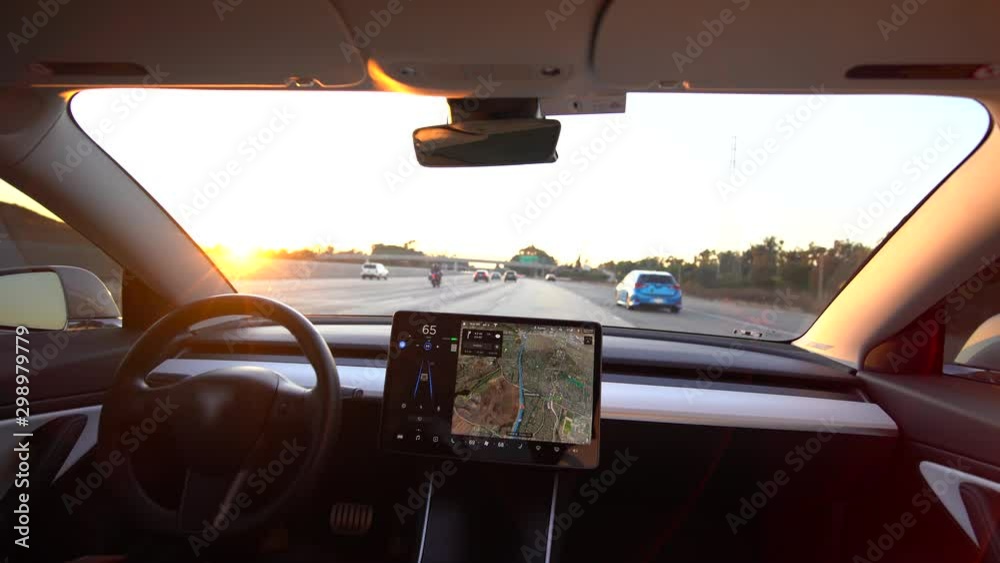 Interior view of an autonomous car or electric vehicle in full self driving autopilot mode showing the advanced innovation of EV