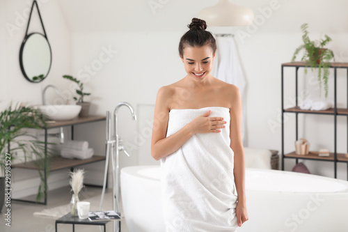 Morning of beautiful young woman in bathroom