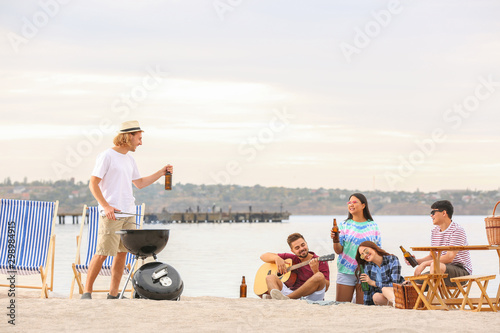 Friends at barbecue party n...