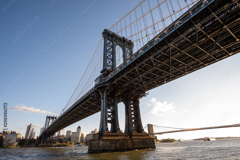 Manhattan Bridge in daylight view from Lower East Side waterfront