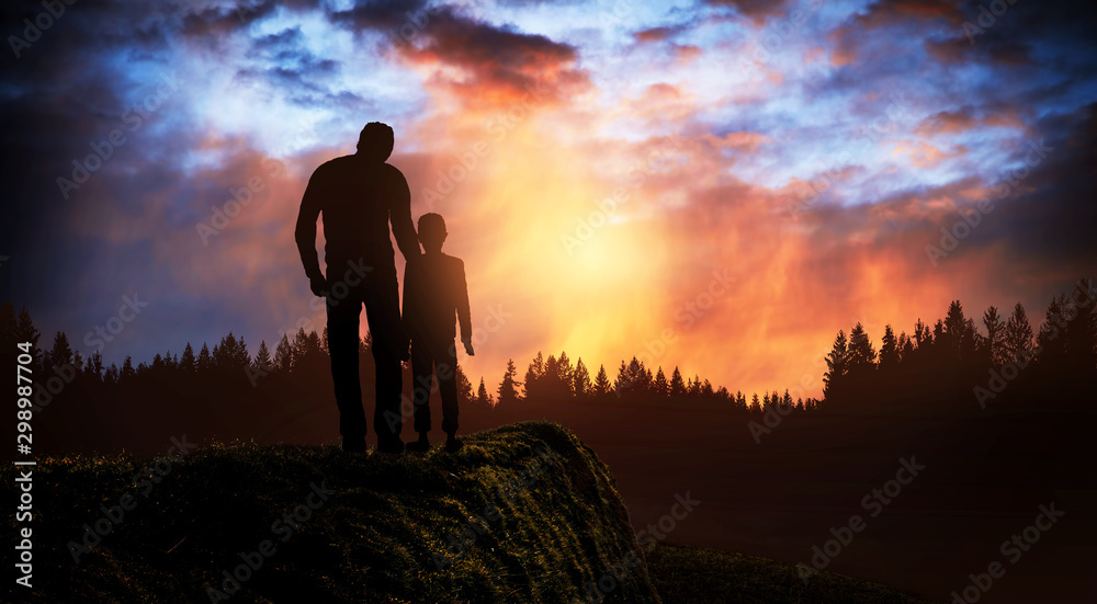 Fotografie father and son at sunset