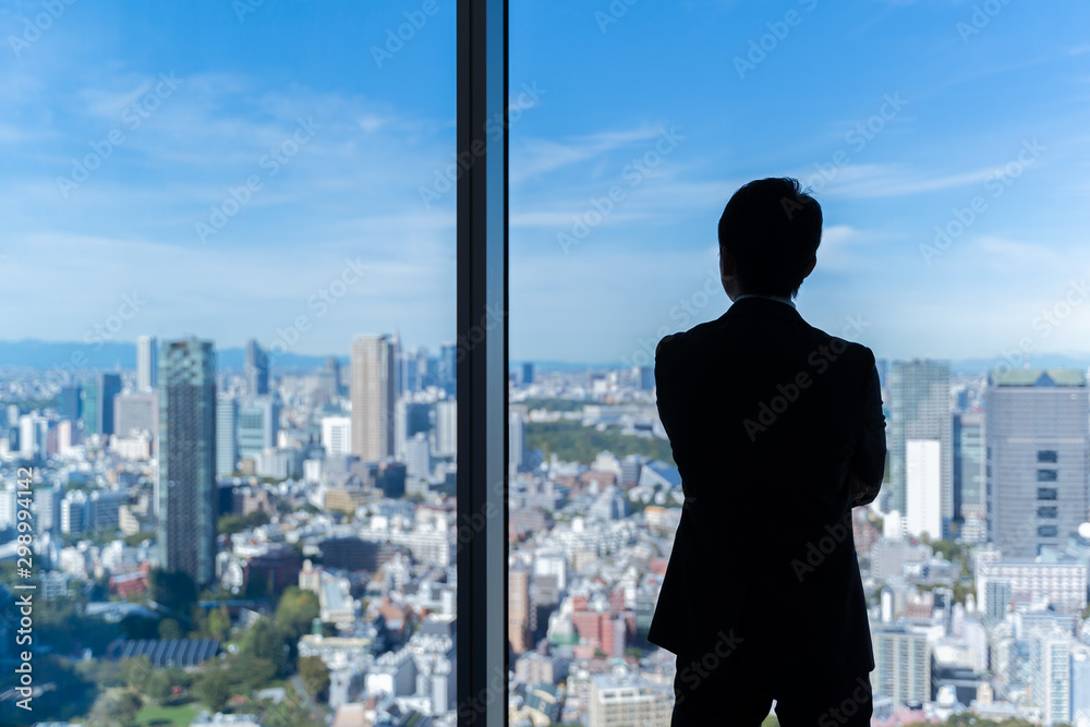 businessman wearing suit looking cityscape of tokyo businessman wearing suit looking cityscape of tokyo