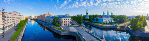 Panorama of St. Petersburg on a summer day. View of the city from a height. Russia. Rivers Of Petersburg. Kryukov canal and Griboyedov canal. Architecture Of St. Petersburg. Nikolsky Cathedral.