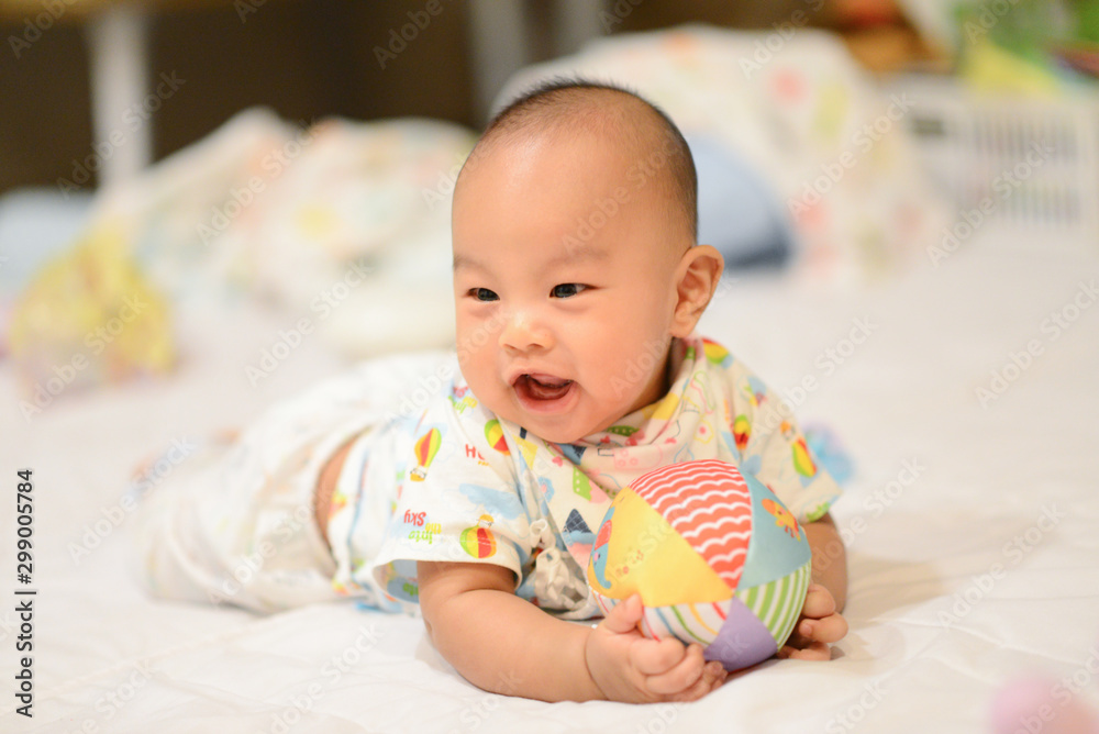 Cute little Asian baby playing Ball Cute little Asian baby playing Ball