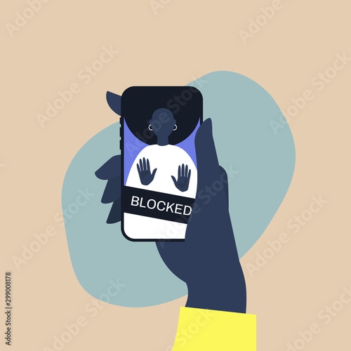 Hand holding a smartphone with a blocked user account, displayed on a screen, privacy in social media
