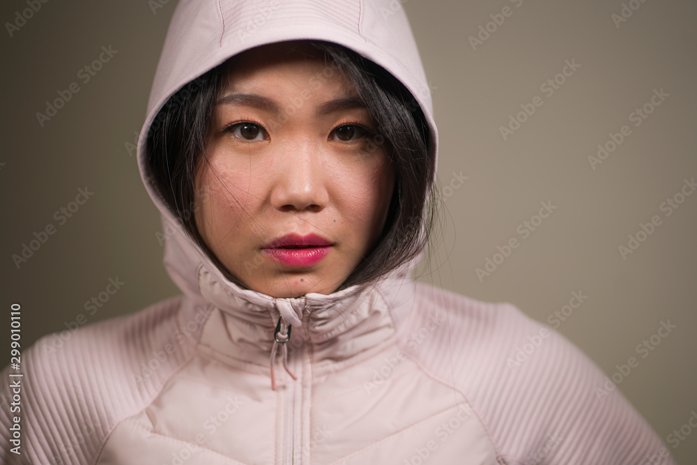 beauty and fashion style isolated portrait of young beautiful and cool Asian Korean student woman in pink hood winter jacket in cute face expression isolated beauty and fashion style isolated portrait of young beautiful and cool Asian Korean student woman in pink hood winter jacket in cute face expression isolated