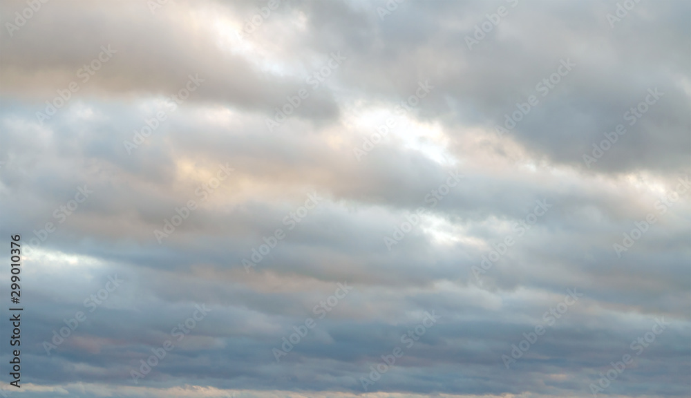 Partial clouds. Clearing day. Dark sky on the background with Air clouds. sky panorama, scattered cumulus clouds for backdrop wallpaper, desktop. Copy space. Partial clouds. Clearing day. Dark sky on the background with Air clouds. sky panorama, scattered cumulus clouds for backdrop wallpaper, desktop. Copy space.