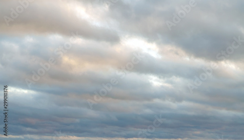 Partial clouds. Clearing day. Dark sky on the background with Air clouds. sky panorama, scattered cumulus clouds for backdrop wallpaper, desktop. Copy space.