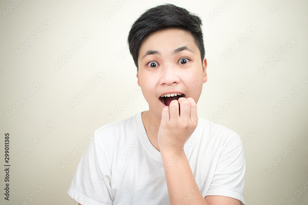 Portrait of young Asian people feeling shocked. Isolated background. Portrait of young Asian people feeling shocked. Isolated background.