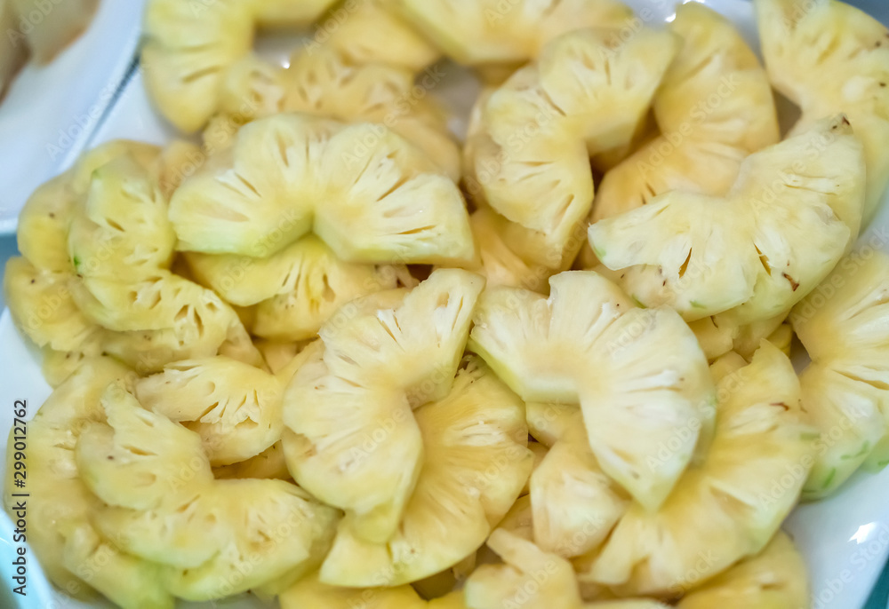 Sliced pineapple as dessert in the party Sliced pineapple as dessert in the party