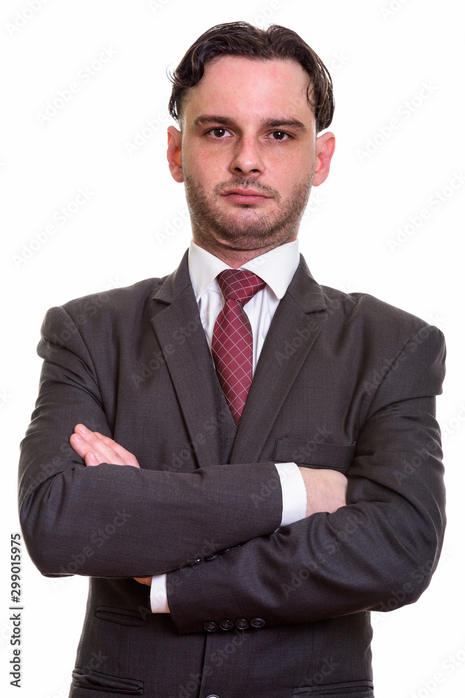Close up of young businessman with arms crossed Close up of young businessman with arms crossed