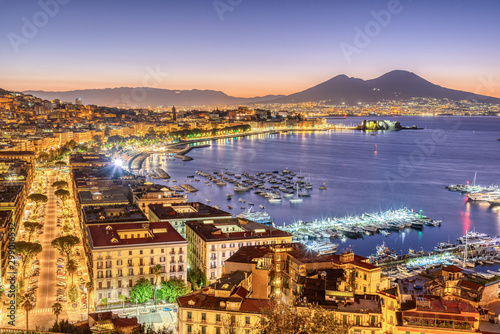 The city of Naples in Italy with Mount Vesuvius before sunrise