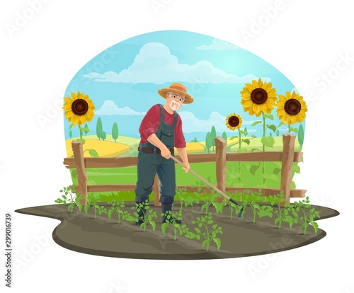 Farmer or gardener with hoe in vegetable garden